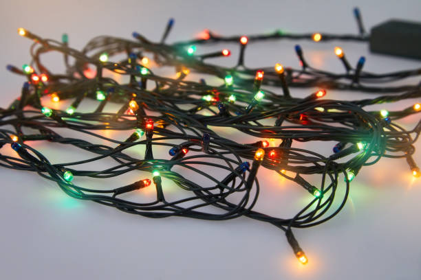 istock Colorful glowing Christmas lights. Holiday background. 1202747038