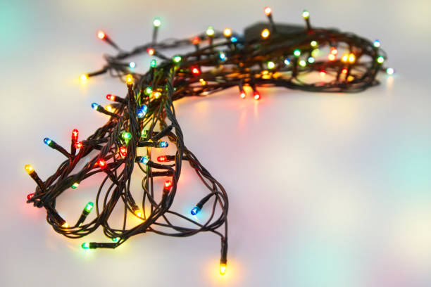 istock Colorful glowing Christmas lights. Holiday background. 1202747082
