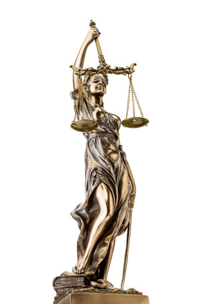 istock Statue of justice isolated on white background 1202748364