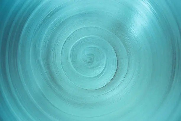 Photo of close-up view spiral lines of abstract background with copy space, trendy aqua menthe color