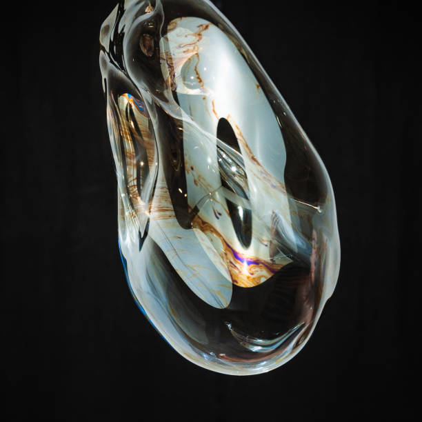 istock Colorful creative amorphous soap bubble floating with a black background 1202749213