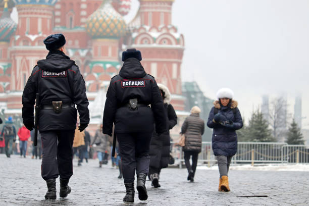 Russian police officers walking on Red square in Moscow stock photo