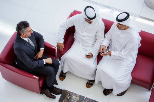 istock Three Arab business men doing business 1202752675