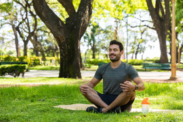 istock Man working out in a park 1202755758