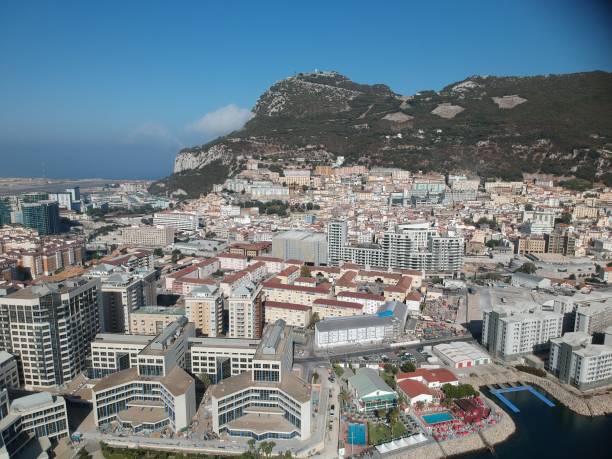istock Aerial view on the Gibraltar city harbor at summer sun light 1202757724