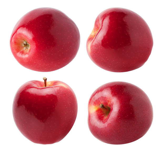 istock Apples collection. Four whole red, pink apple fruit isolated on white, with clipping path 1202757805