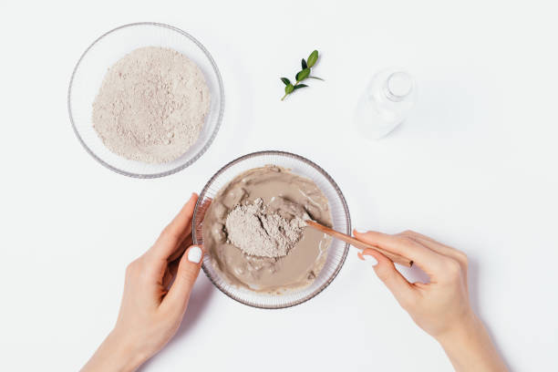 istock Top view woman's hands mix clay 1202758894
