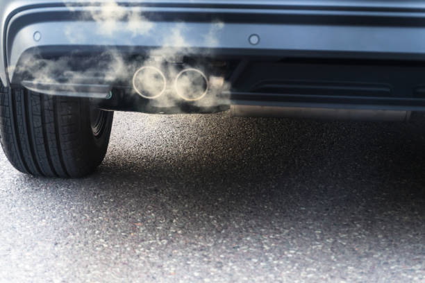 istock cloud of an exhaust gas pollution 1202760486