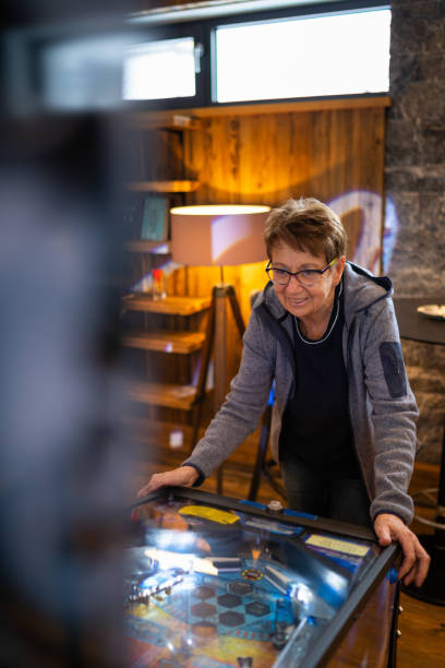 Free Stock Photo of Woman Standing in Front of Pinball Machine ...