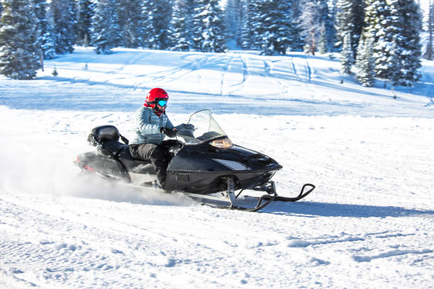 istock Driving snowmobile in Colorado, USA 1202765425