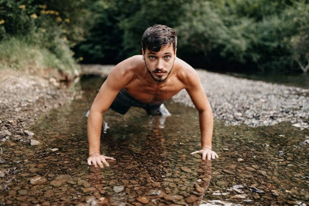 istock Men having sports day in nature 1202768140