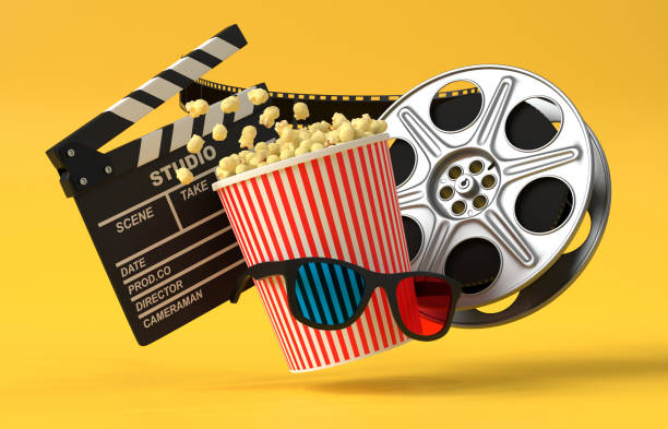 pop-corn volant, lunettes 3d, bobine de film et clapboard sur un fond jaune - film divertissement photos et images de collection