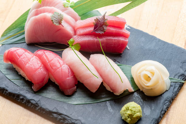 istock Sushi rolls and sashimi, traditional Japanese Cuisine 1202772508