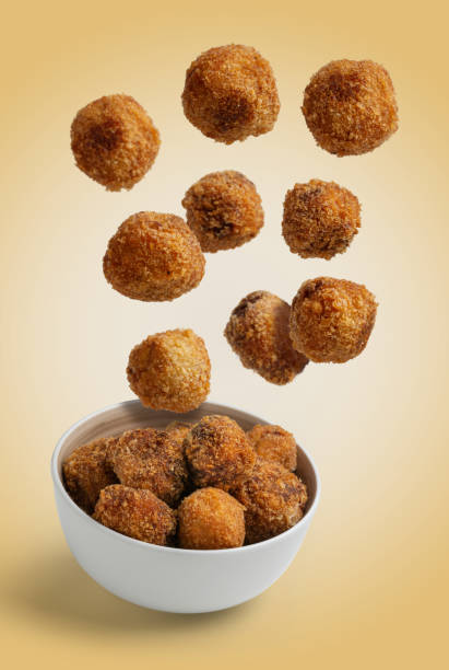 istock Homemade croquettes flying isolated background 1202772981