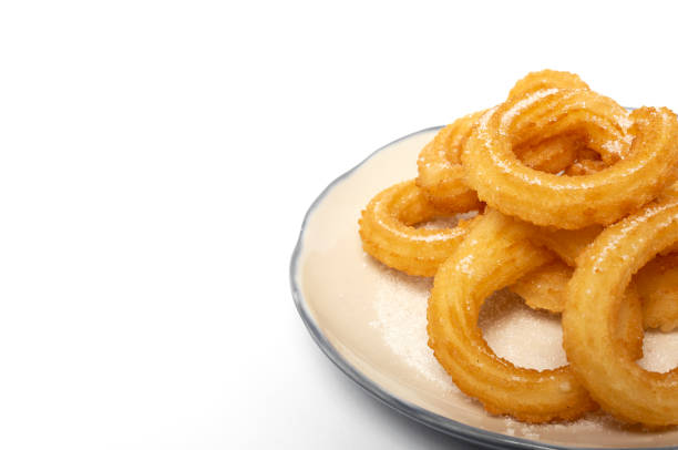 istock Cup of chocolate sauce with churros 1202774684