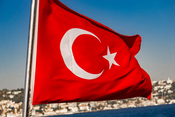 istock Turkish national flag at Bosphorus in Istanbul 1202776107