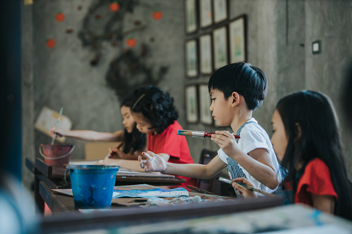 Thai school children enjoy doing art class at school