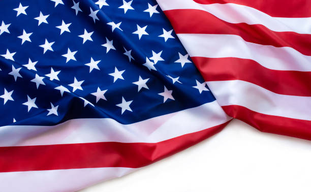 istock American flag isolated on white background 1202777872