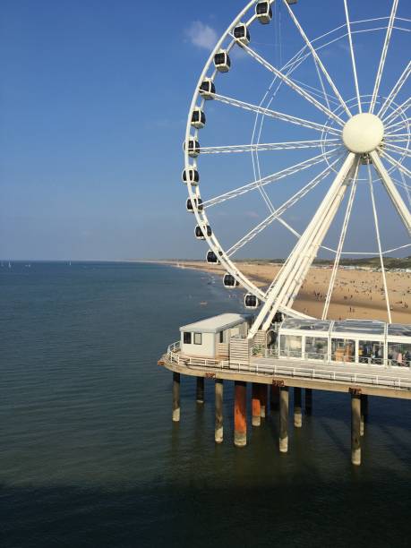 istock Ferris Wheel At  SCHEVENINGEN Beach in the Hague Netherlands 1202779494