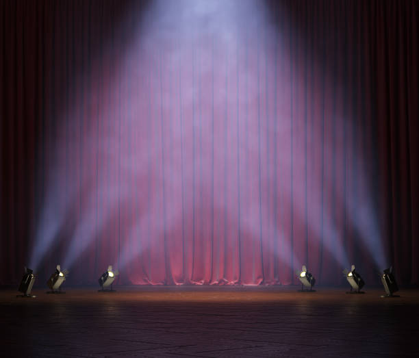 istock Theater curtains and stage with volume light and smoke. 1202781141