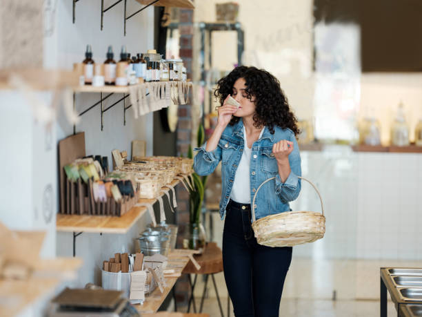 istock Latin woman smelling products in zero waste store 1202789099