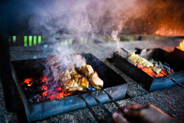 istock Juicy slices of meat prepare on fire 1202790964
