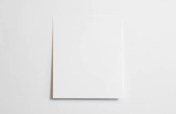 istock Blank polaroid photo frame with soft shadows isolated on white paper background as template for graphic designers presentations, portfolios etc. 1202791433