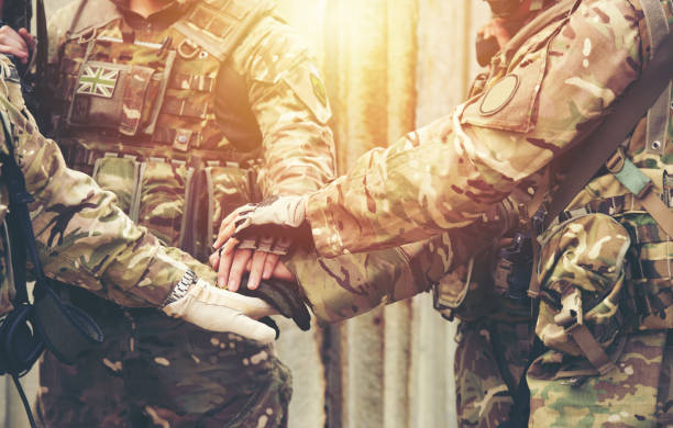 istock together collaborate of hands teamwork soldier 1202792295