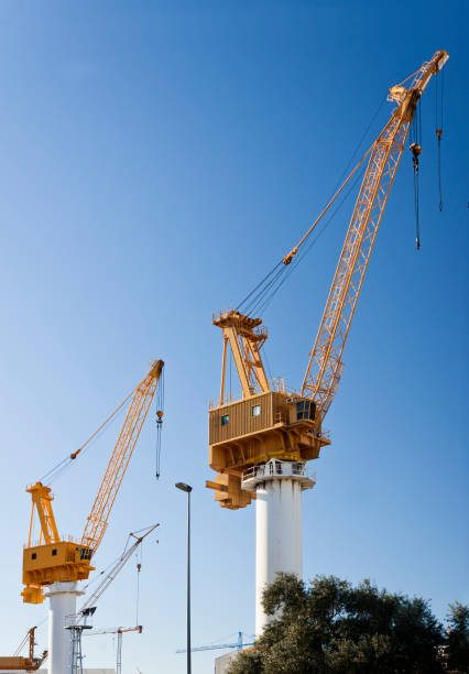 Yellow cranes in the shipyard for ships construction in Vigo, Pontevedra, Spain