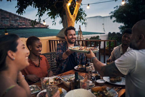 istock Nothing forges a friendship like sharing food 1202792704
