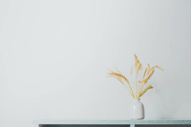 istock Spikelets or wheat in a vase on the table. 1202792714