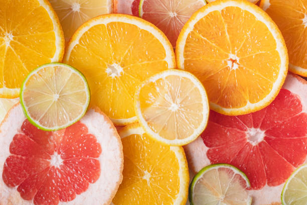 istock Fresh juicy citrus fruit background. 1202792852