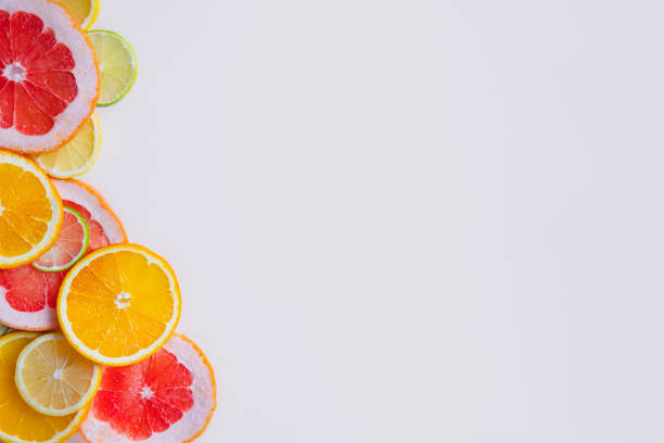 istock Fresh juicy citrus fruit background with copy space. 1202792878