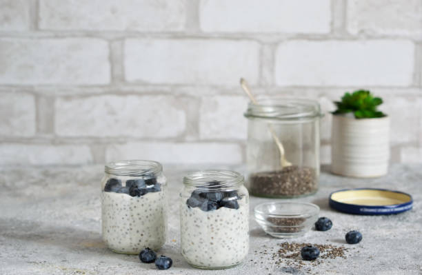 Chia pudding with blueberries for breakfast. Stone background. stock photo
