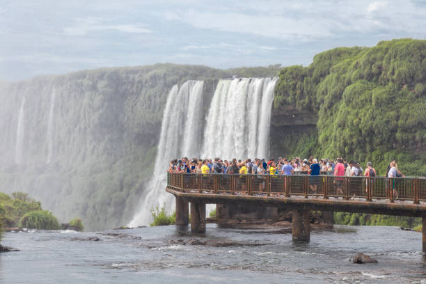 istock Argentina Iguazu Waterfalls with Visitors 1202801686