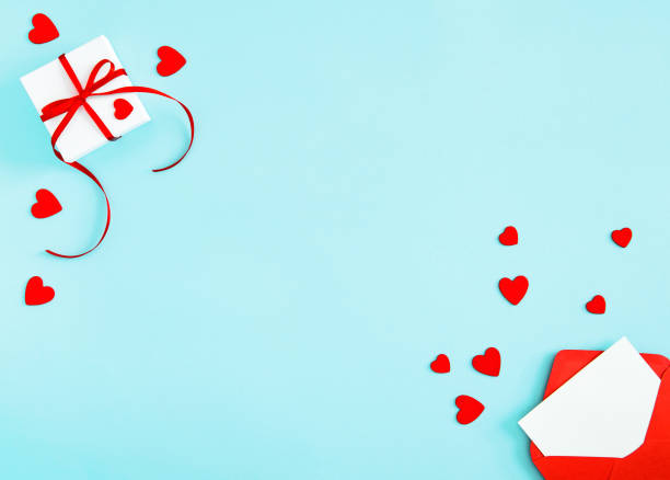 istock Gift box red hearts decoration love letter Valentines day flat lay 1202805114