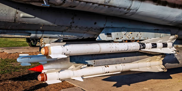 istock military aicrafts with rockets 1202807436