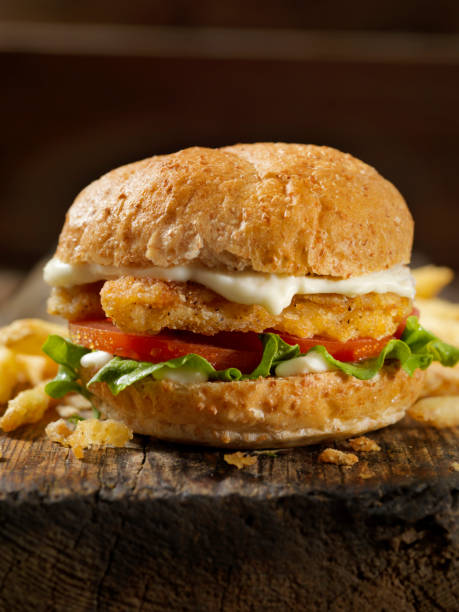 istock Vegan, Meatless-Plant Based Protein Chicken Strip Burger on a Whole Wheat Bun with Lettuce Tomato 1202811884
