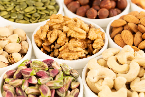 istock The heap of various nuts 1202814717