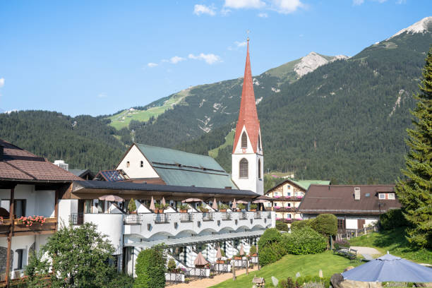 istock Alpine landscape with Parish Church, Seefeld, Austria 1202814772