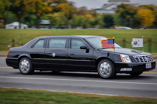 Washington, District of Columbia - October 23, 2017:  The presidential limosine, nicknamed 'The Beast,' carries President Trump in a motorcade.