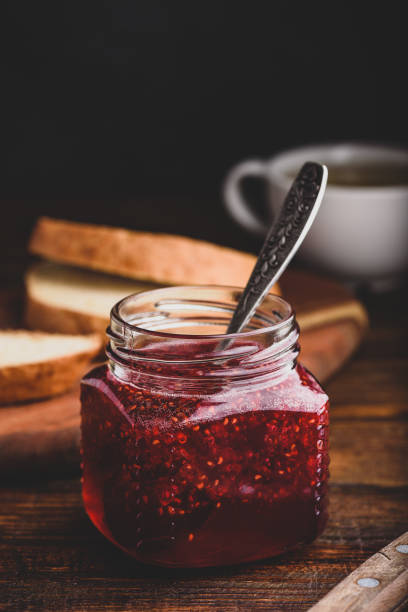 istock Jar of homemade raspberry jam 1202818612