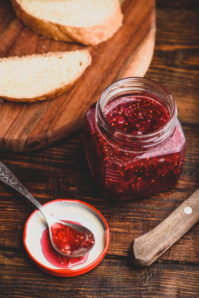 istock Jar of homemade raspberry jam 1202818629