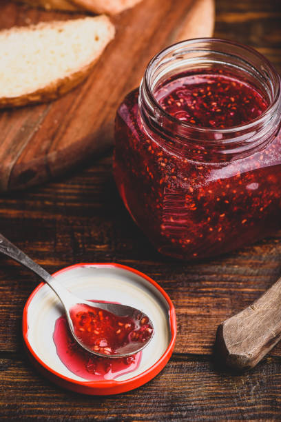 istock Jar of homemade raspberry jam 1202818643