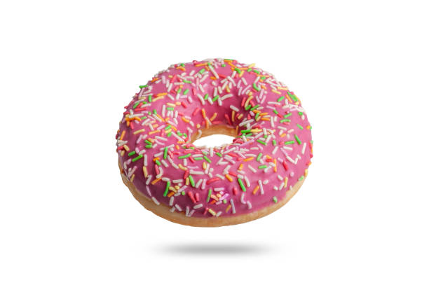 istock pink glazed donut with colored sprinkles. isolated on white background 1202819601