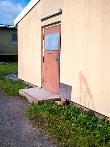 An old style of military accommodation, also known as a 'billet' usually basic, cold and filled with many bunk beds.