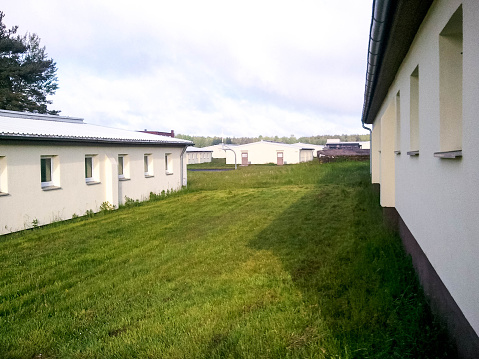 An old style of military accommodation, also known as a 'billet' usually basic, cold and filled with many bunk beds.