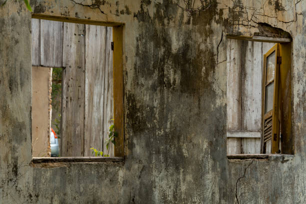 istock Destroyed aged old house in pieces. 1202822238