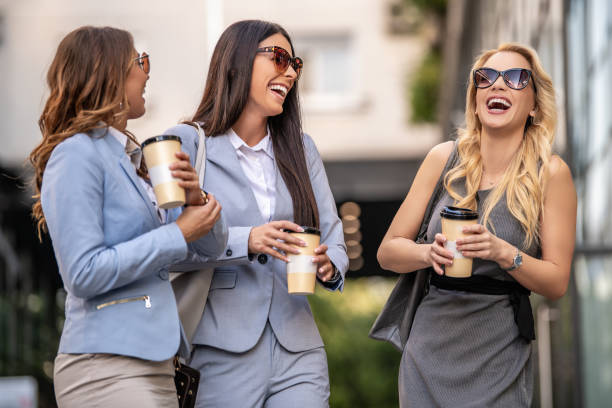 istock Three businesswomen in front of their workplace 1202824846