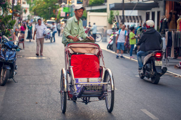 The Old Quarter, The Hanoi Street, rickshaw in the streets of Vietnam Hanoi, Vietnam - june 11, 2019: The Old Quarter, The Hanoi Street, rickshaw in the streets of Vietnam vietnamese man taxi motorbike driver stock pictures, royalty-free photos & images